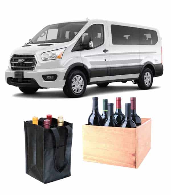 White passenger van and a wooden box filled with wine